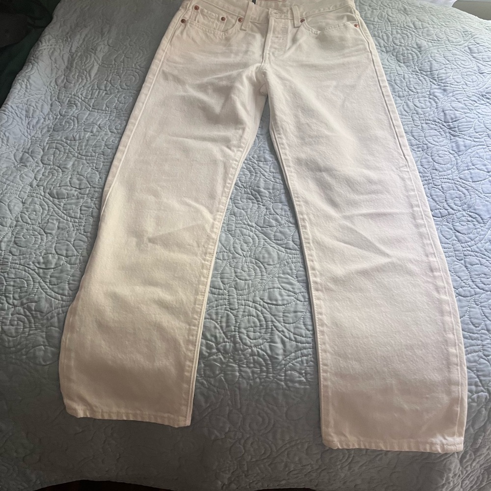 Women’s Levi  Button Fly white jeans, New with tags. Size 27,